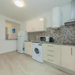 B21 - Oliveira Cozy Flat לאגוּ‏ש