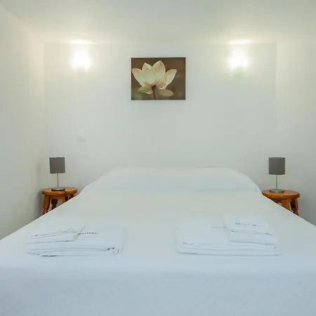 B21 - Oliveira Cozy Flat לאגוּ‏ש